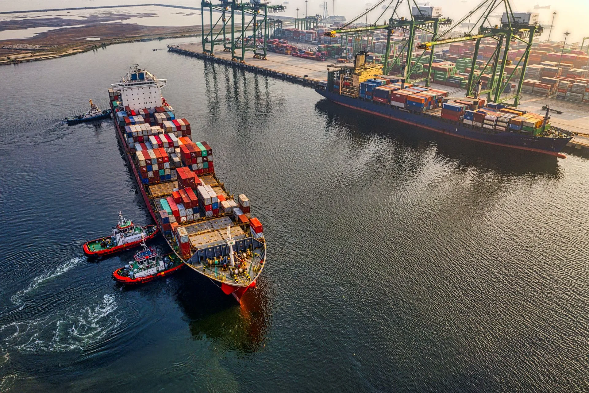 Aerial view of a container cargo ship crossing the ocean